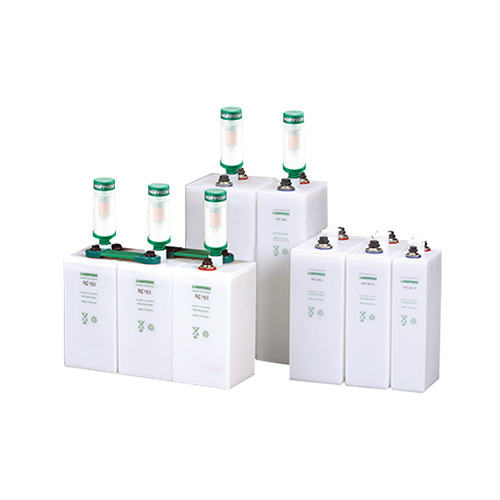 A group of six white boxes with green handles.