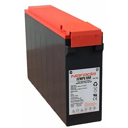 A red and black battery is sitting on top of a table.