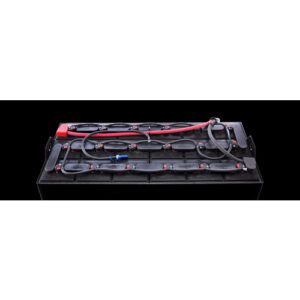A black tray with wires and a red handle.