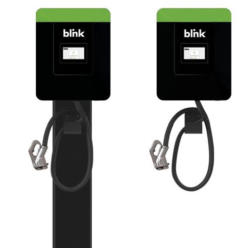 A black and green charging station with two different types of chargers.